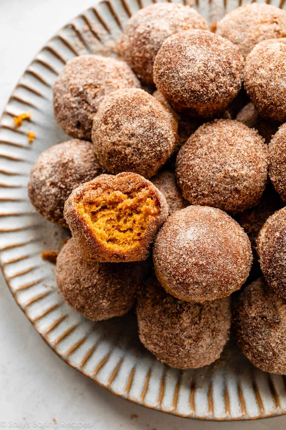 close-up showing inside of a mini pumpkin muffin.