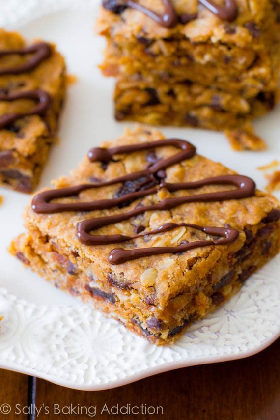 peanut butter chunk oatmeal bars on a white plate