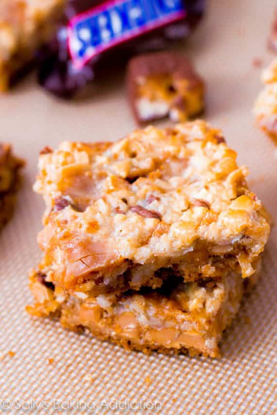 caramel Snickers 7 layer bars on a silpat baking mat