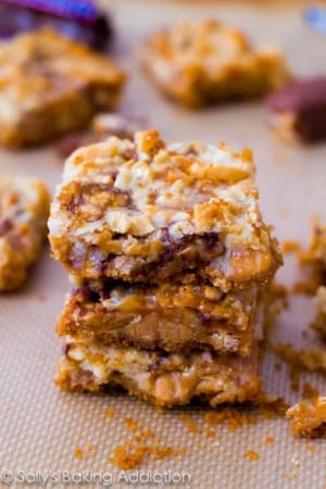 stack of caramel Snickers 7 layer bars