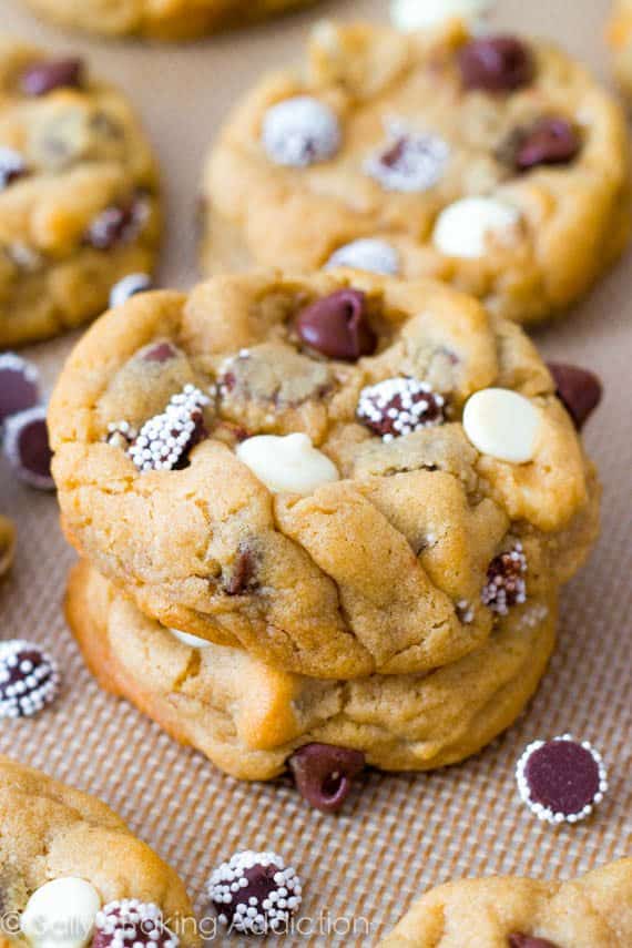 stack of triple chocolate chip cookies on a silpat baking mat