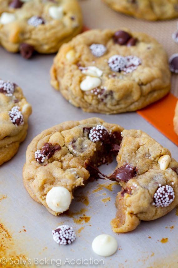 triple chocolate chip cookies on a baking sheet