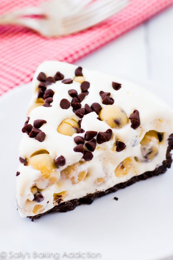 slice of chocolate chip cookie dough ice cream pie on a white plate