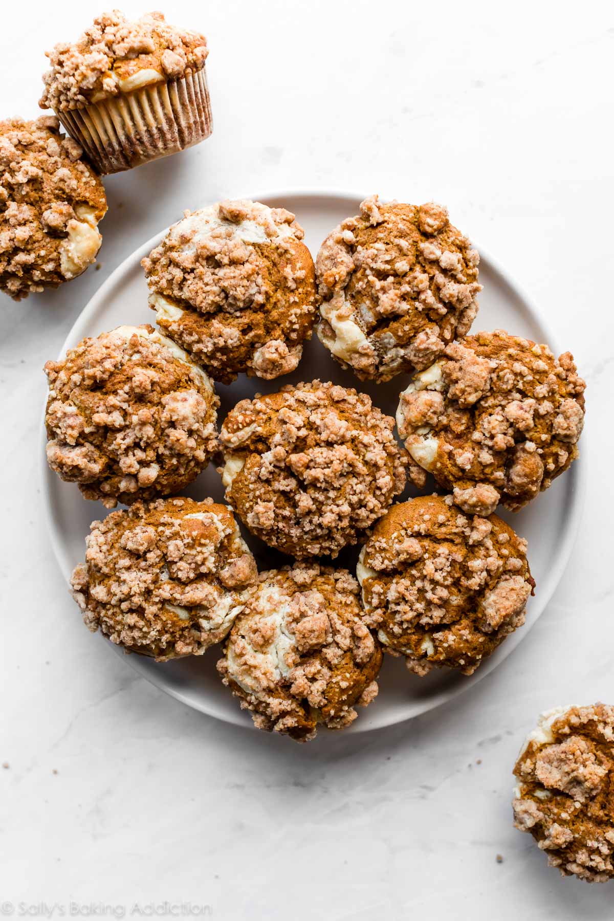 plate of pumpkin cheesecake muffins