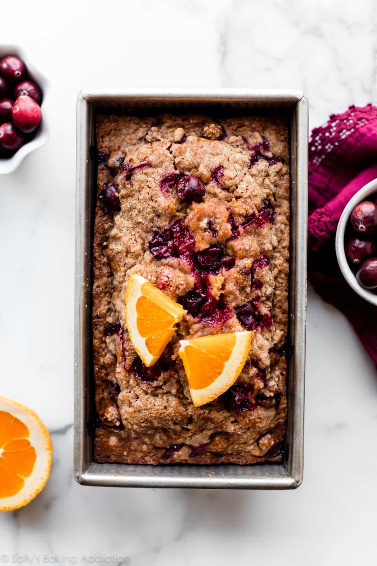 orange cranberry bread in a loaf pan