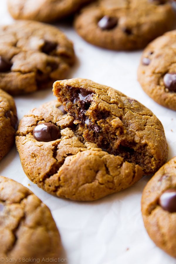 almond butter chocolate chip cookies with one broken in half