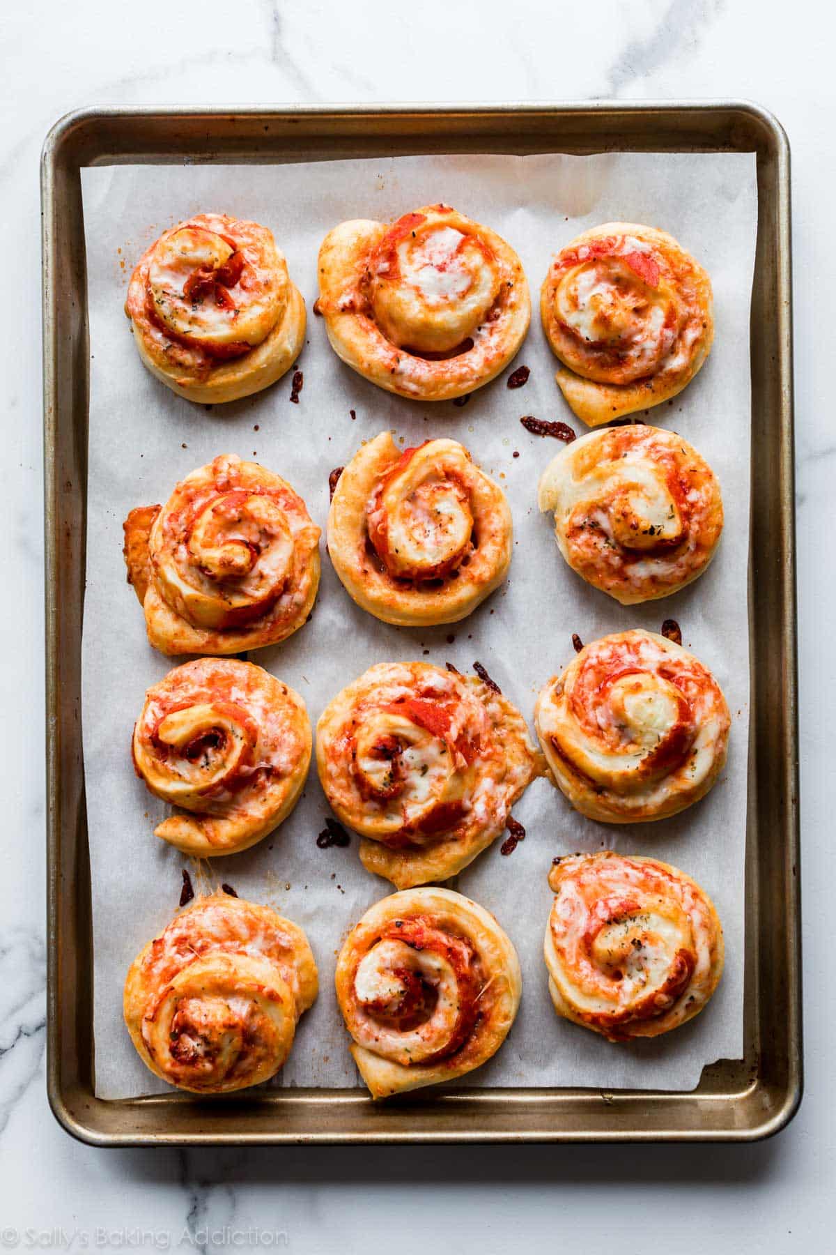 Pizza rolls on baking sheet after baking