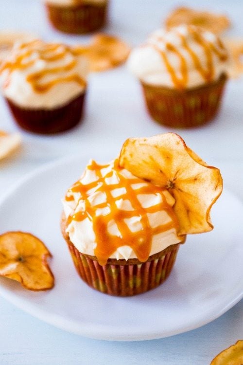 apple spice cupcakes with salted caramel frosting, and a drizzle of salted caramel