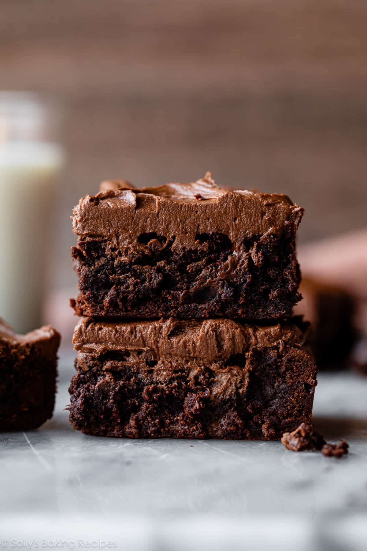 2 frosted brownies stacked.