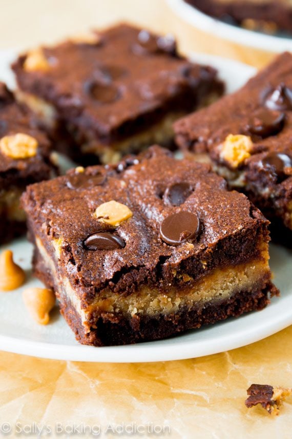 peanut butter stuffed brownies on a white plate