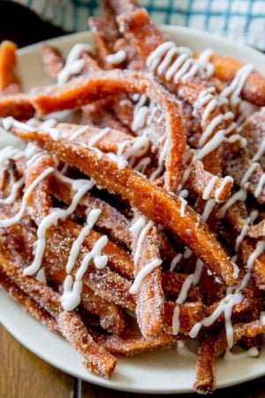 cinnamon sugar sweet potato fries drizzled with vanilla icing