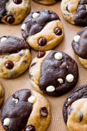 double chocolate chip swirl cookies on a silpat baking mat