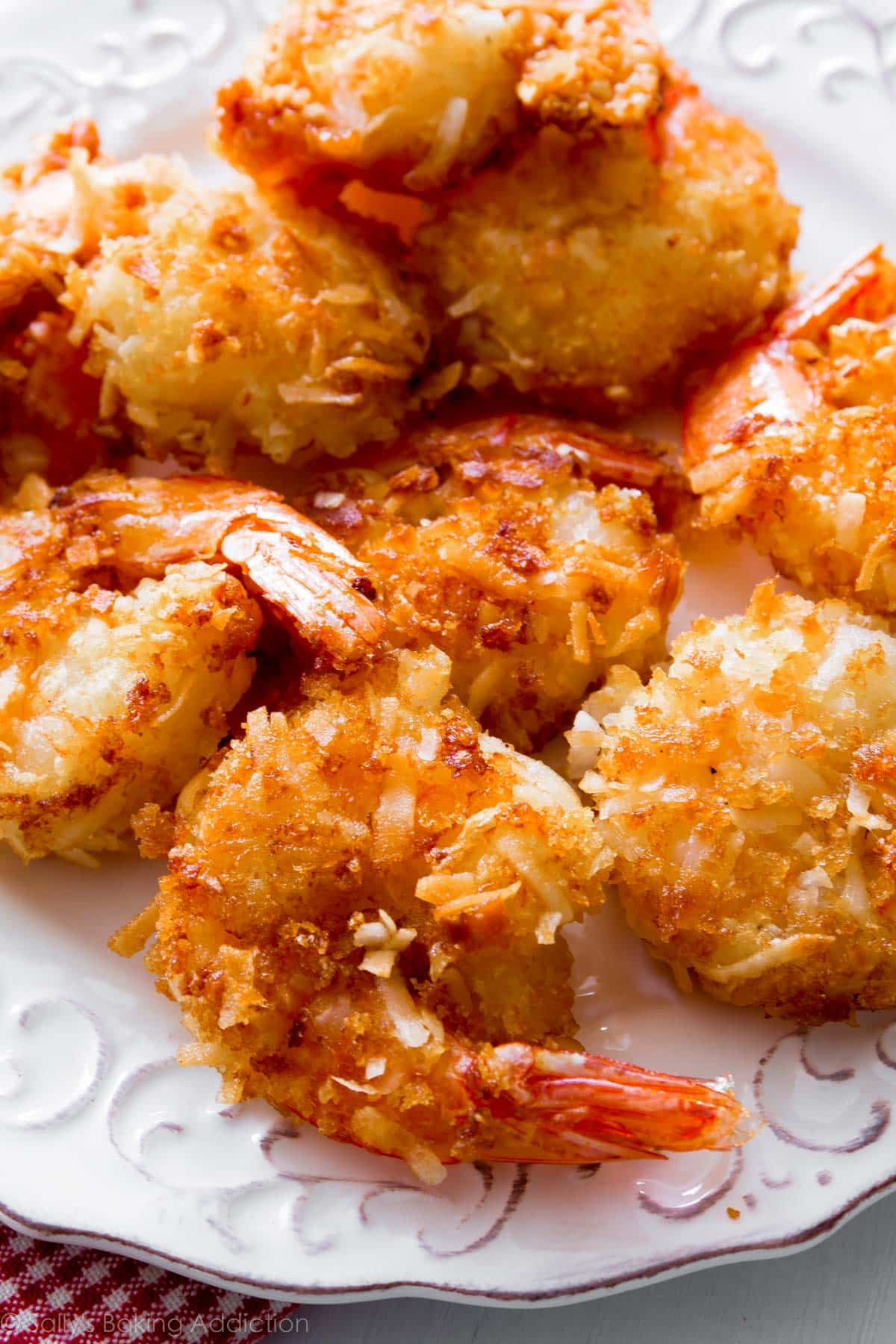 coconut shrimp on white plate.