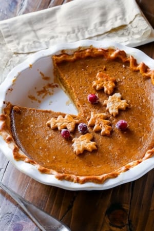 pumpkin pie with one slice missing