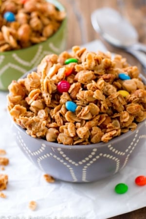 honey roasted peanut butter granola in a gray and white bowl