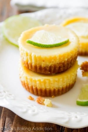 stack of mini key lime pies on a white plate