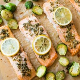 lemon herb salmon on a baking sheet