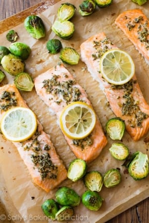 lemon herb salmon on a baking sheet