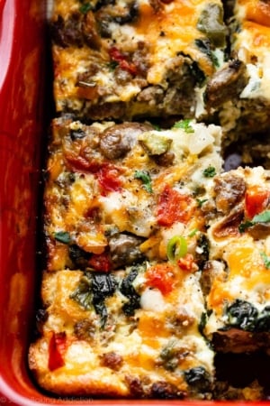 breakfast egg casserole with peppers, spinach, mushrooms, and cheese.