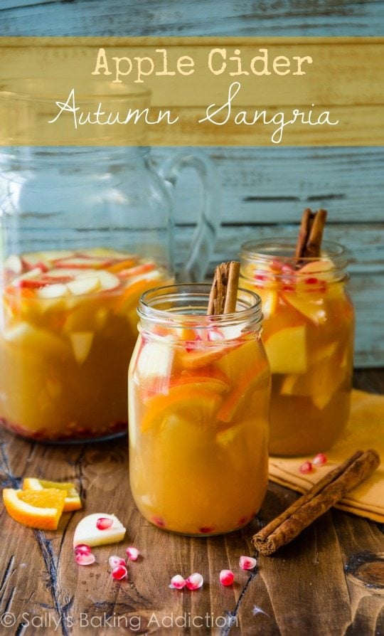 apple cider sangria in glasses with cinnamon sticks