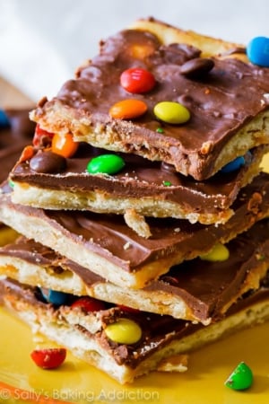 stack of pieces of Saltine toffee with mini M&Ms on top