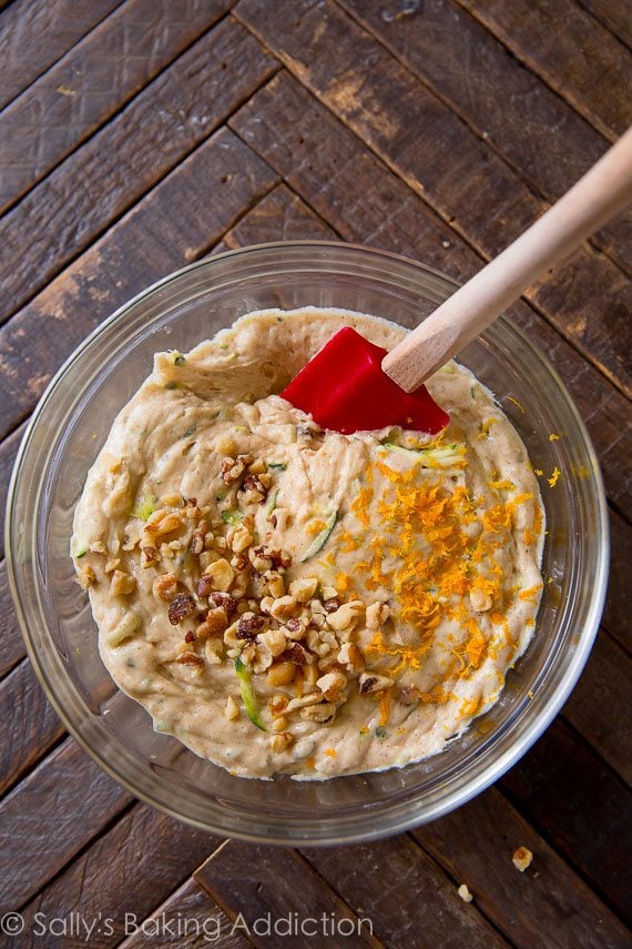 Greek yogurt zucchini bread batter in a glass bowl