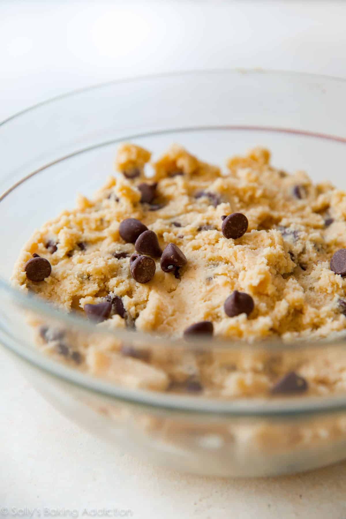 chocolate chip cookie dough in a glass bowl