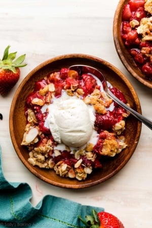 strawberry vanilla crisp with ice cream on top