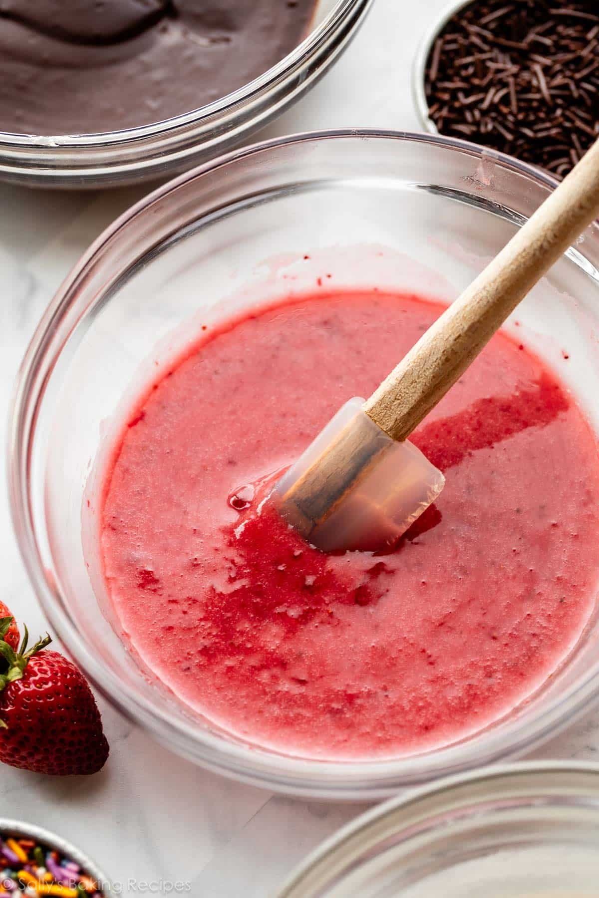 strawberry frosting glaze in glass bowl.