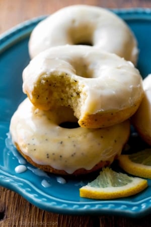 lemon poppy seed donuts on a blue plate