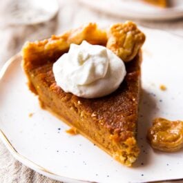 slice of sweet potato pie on a white plate