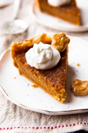 slice of sweet potato pie on a white plate