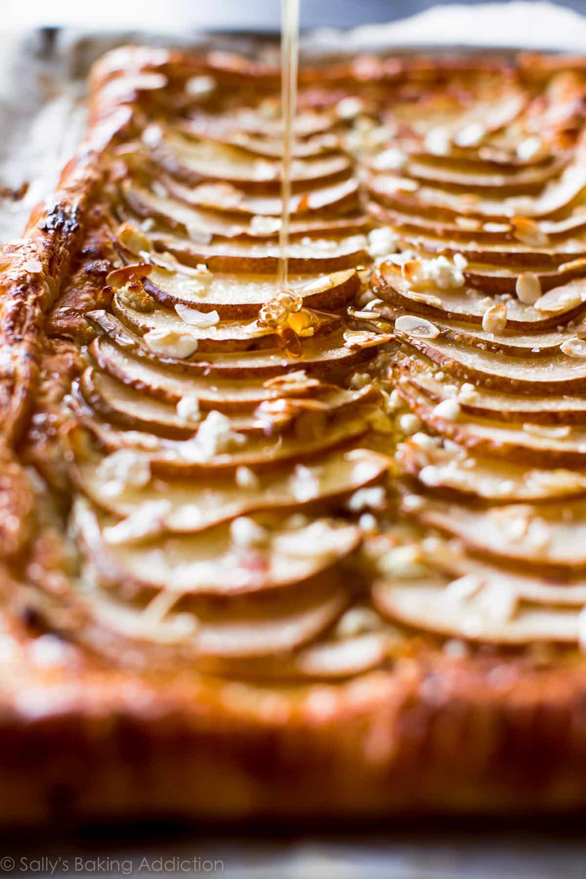 drizzling honey onto honey pear tart