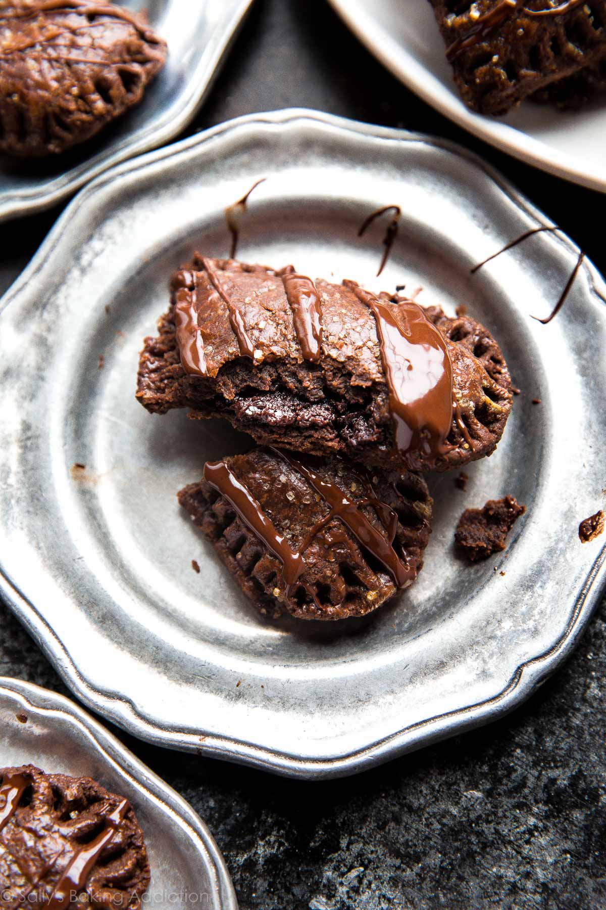 heart shaped chocolate hand pie on a silver plate