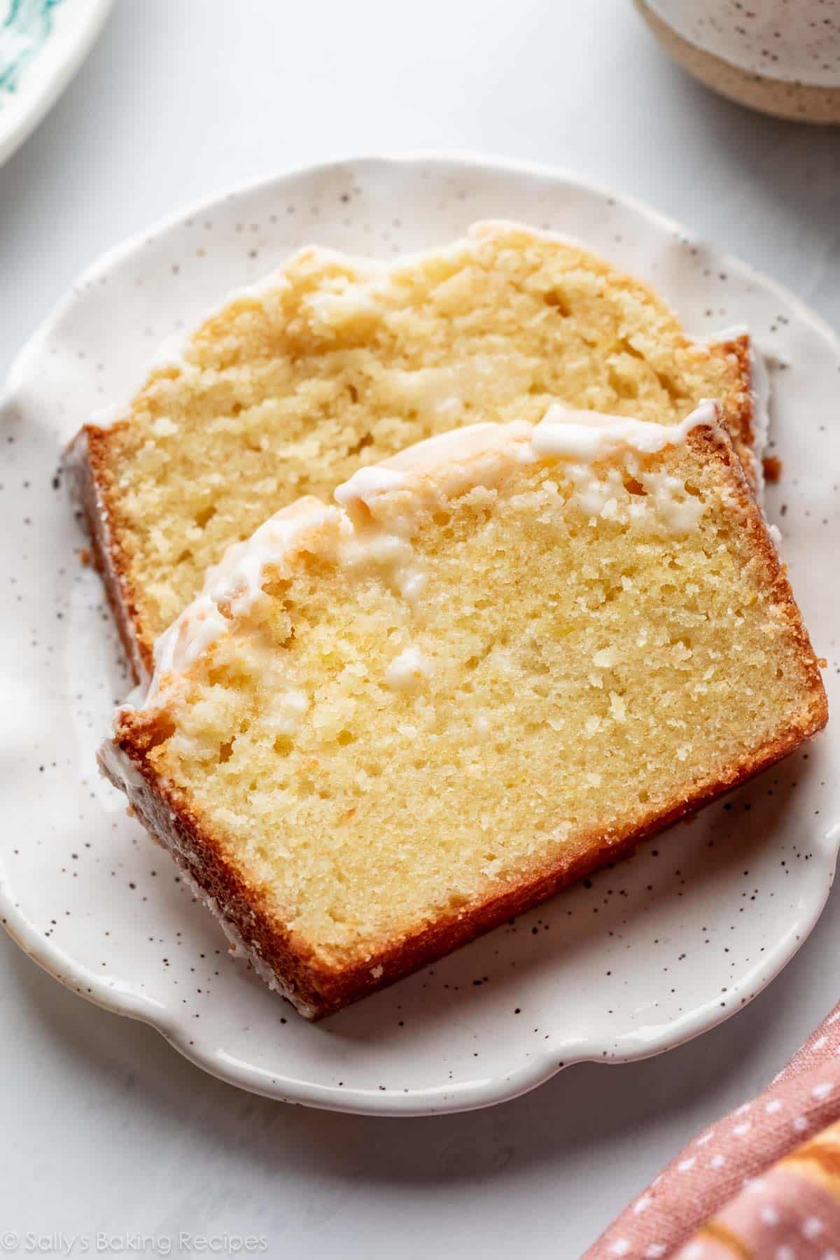 lemon pound cake slices on white plate.