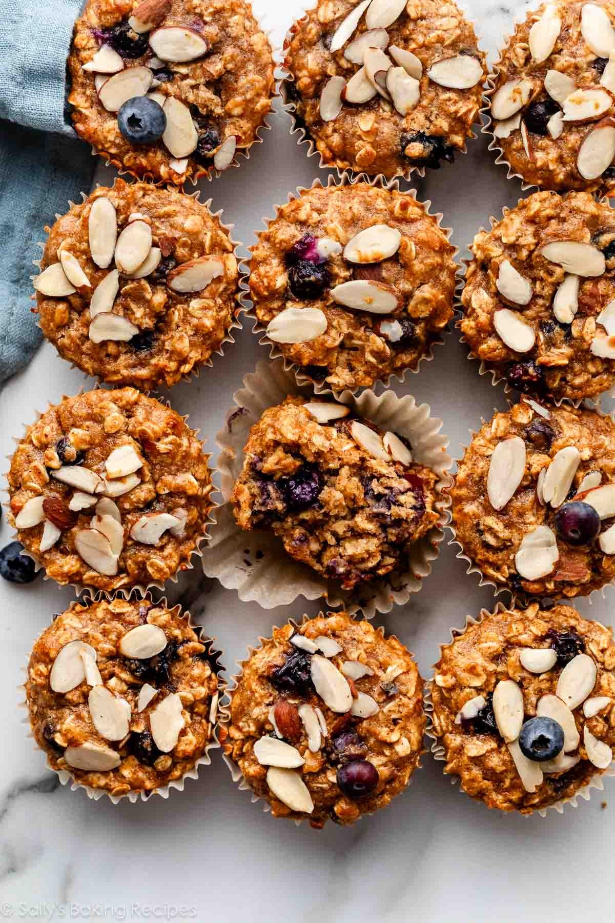 gluten free blueberry almond muffins with fresh blueberries and sliced almonds.