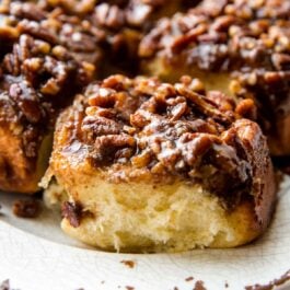 maple pecan sticky buns on a white serving tray