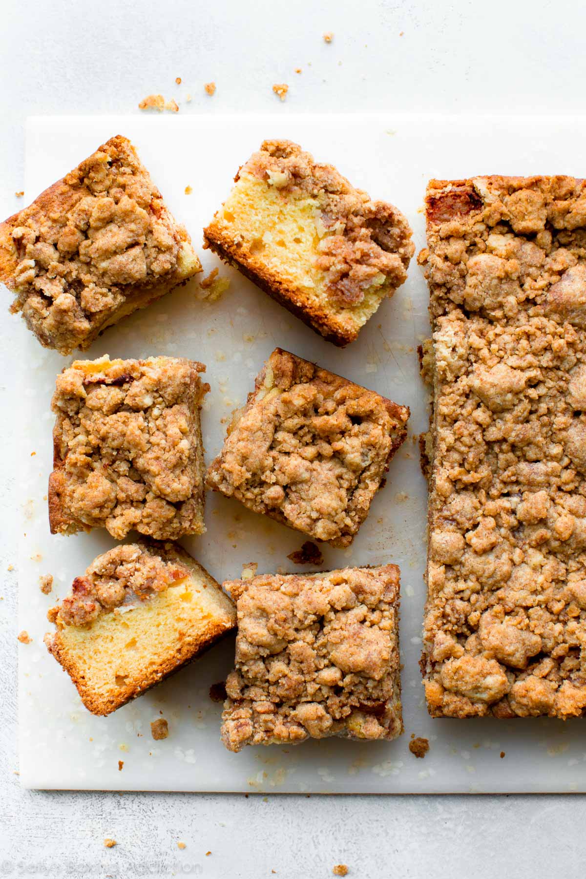 overhead image of apple crumb cake cut into squares