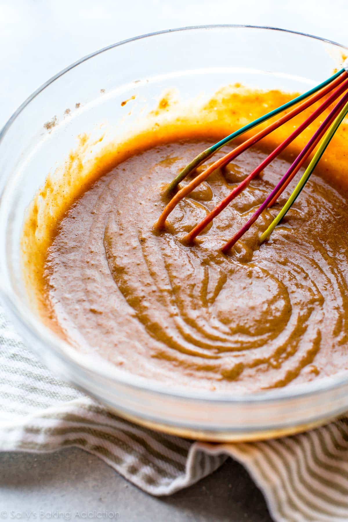 pumpkin cake batter in a glass bowl