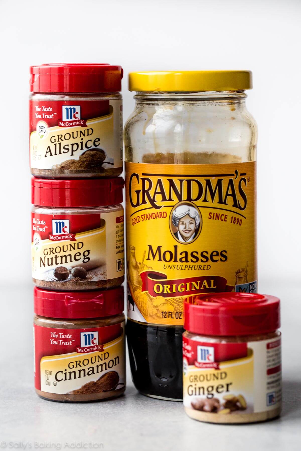 ingredients for gingerbread fudge including allspice, nutmeg, cinnamon, ginger, and molasses