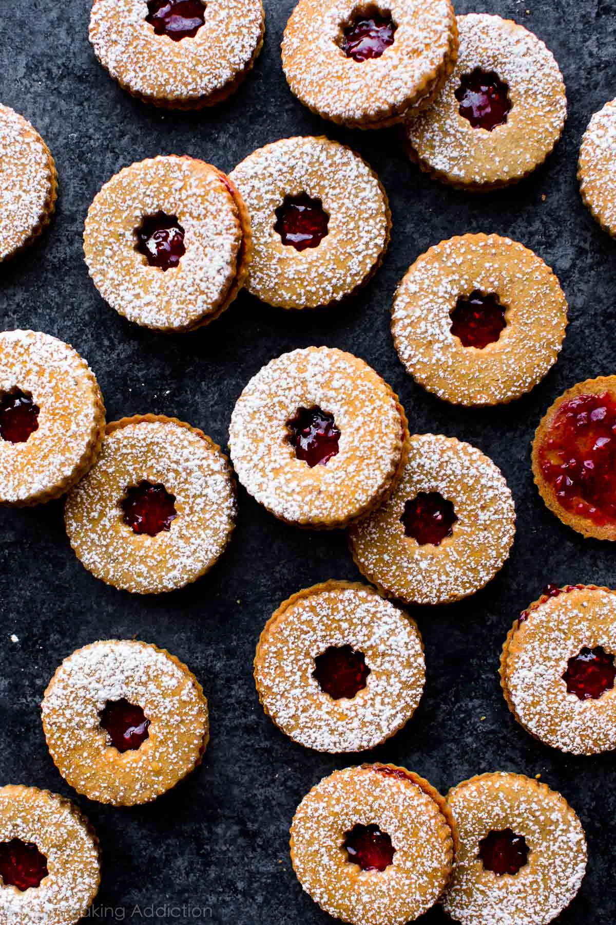 overhead image of raspberry pistachio linzer cookies