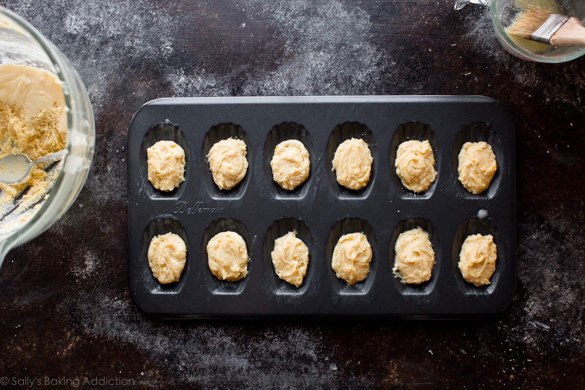 madeleine batter in madeleine pan before baking