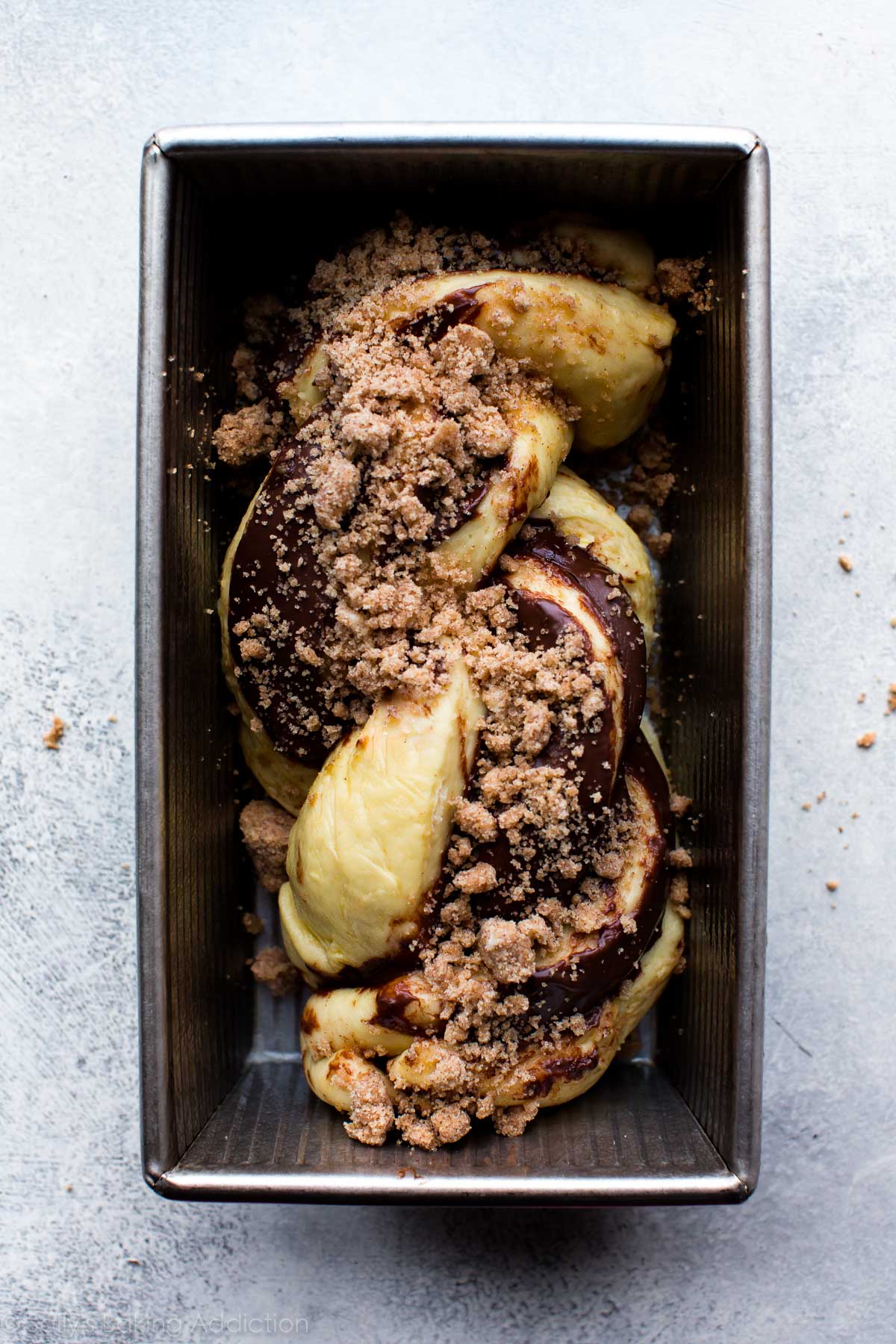 Nutella babka in loaf pan before baking