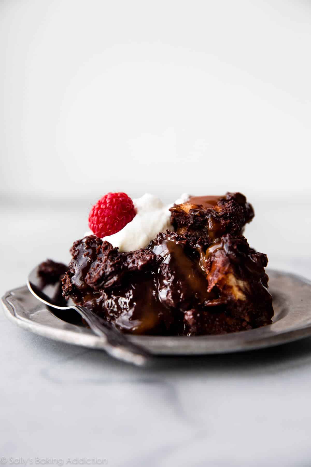 chocolate bread pudding serving on a silver plate