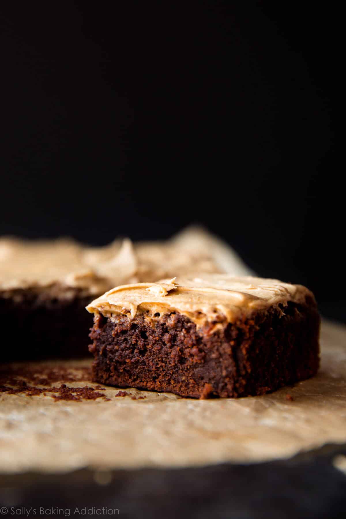 Guinness brownies cut into squares with Guinness frosting