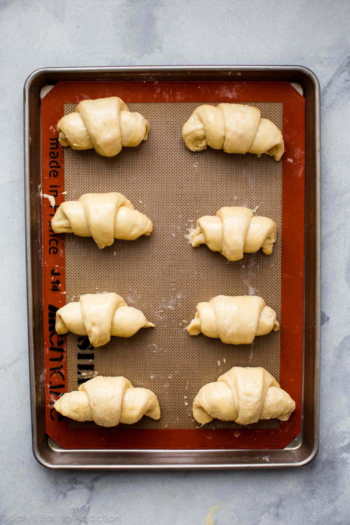 croissants on a baking sheet before baking