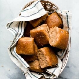 basket of whole wheat dinner rolls