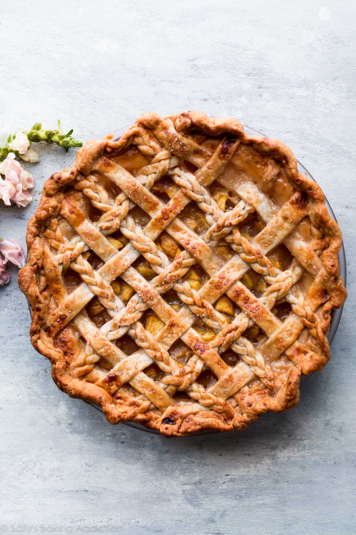 overhead image of peach pie after baking