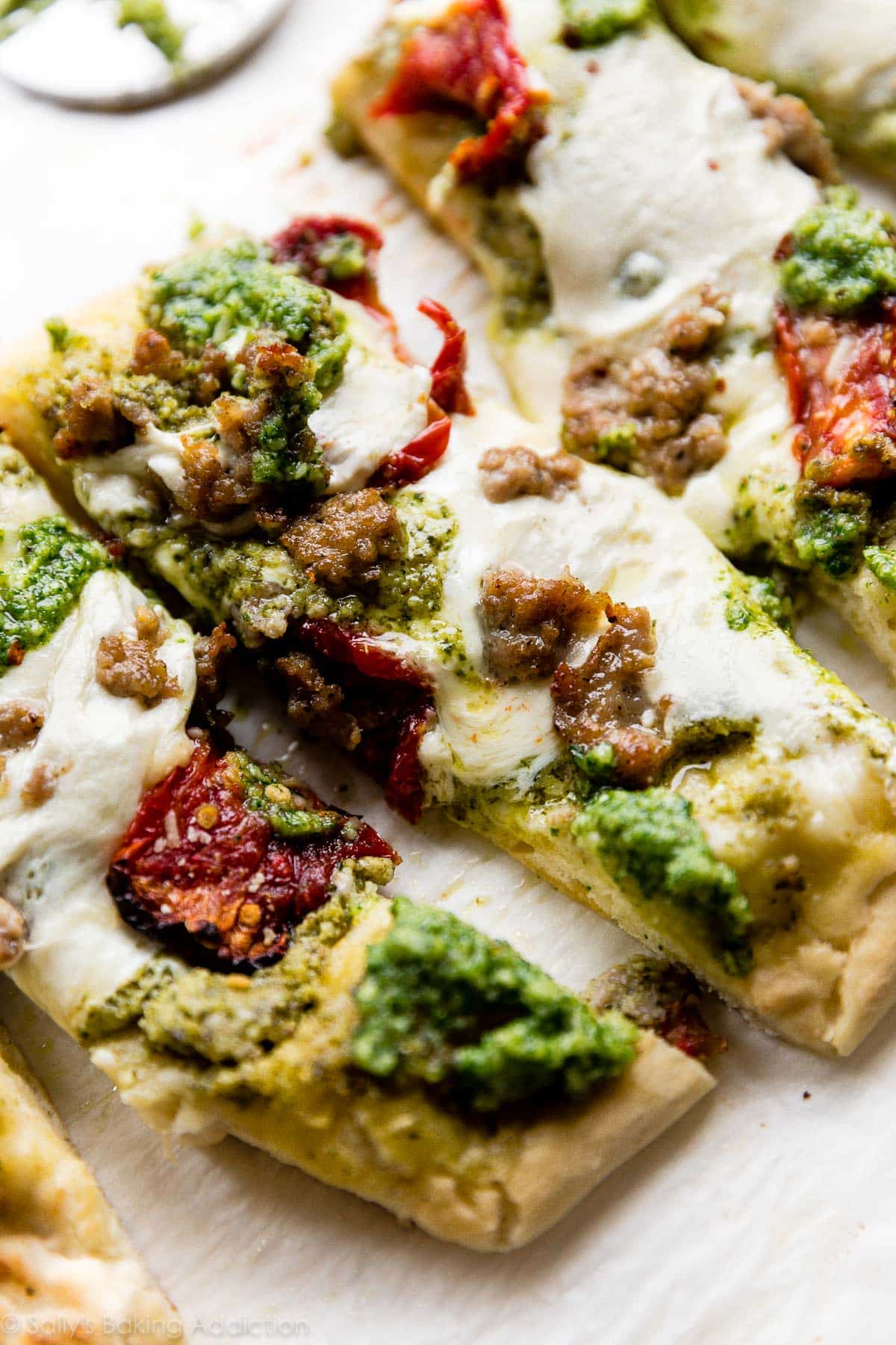 garlic pesto flatbread with sausage