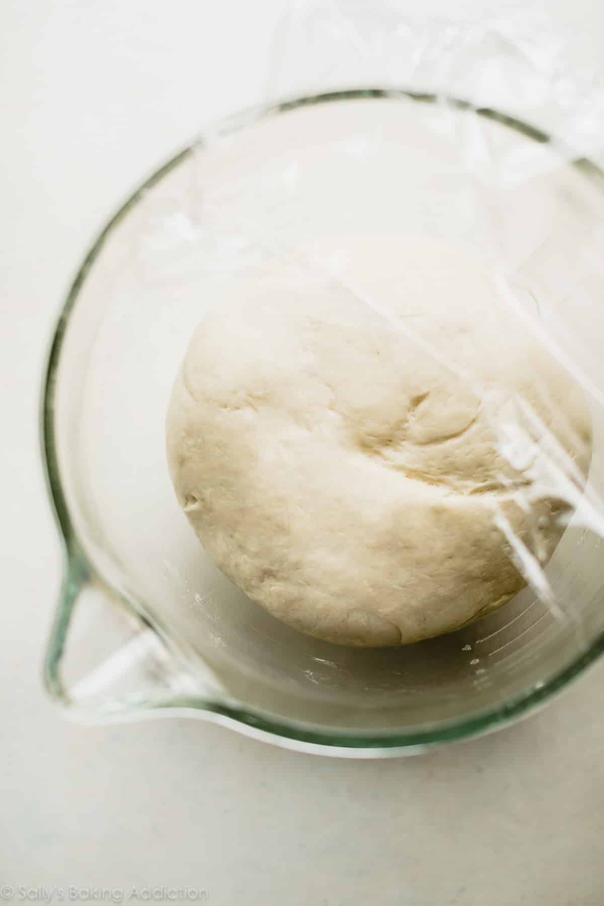 bread dough in a glass bowl